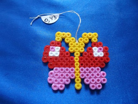 Papillon rouge et rose - Prix : 0,43 euro - 6,5 cm de largeur sur 5,5 cm de hauteur  (2 en stock)